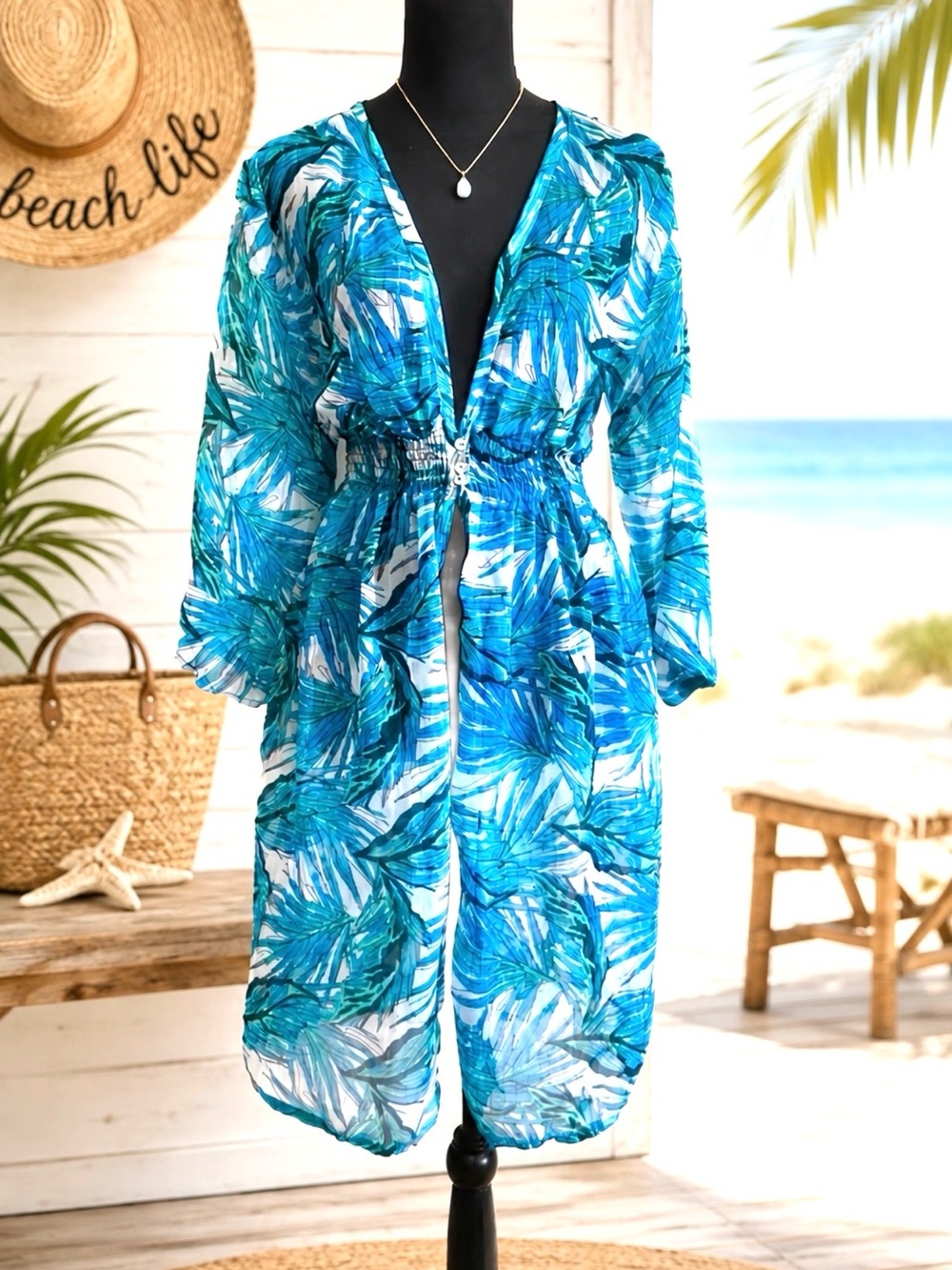 SWIMSUIT COVER-UP Women’s blue and white sheer swimsuit cover-up